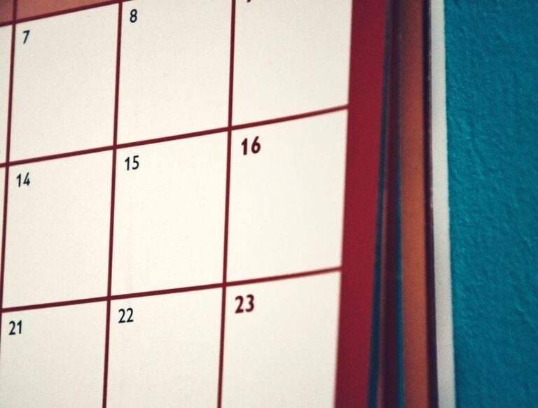 A minimalist calendar hanging on a colorful wall, perfect for planning and organization.