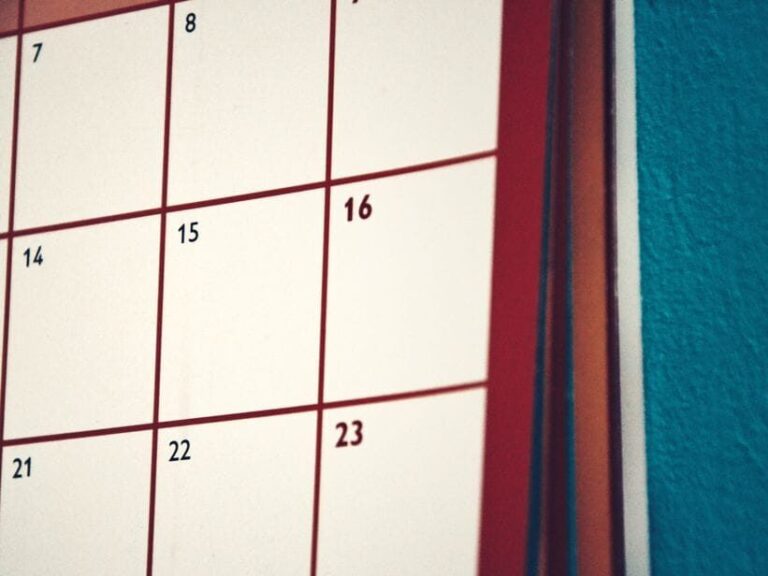 A minimalist calendar hanging on a colorful wall, perfect for planning and organization.